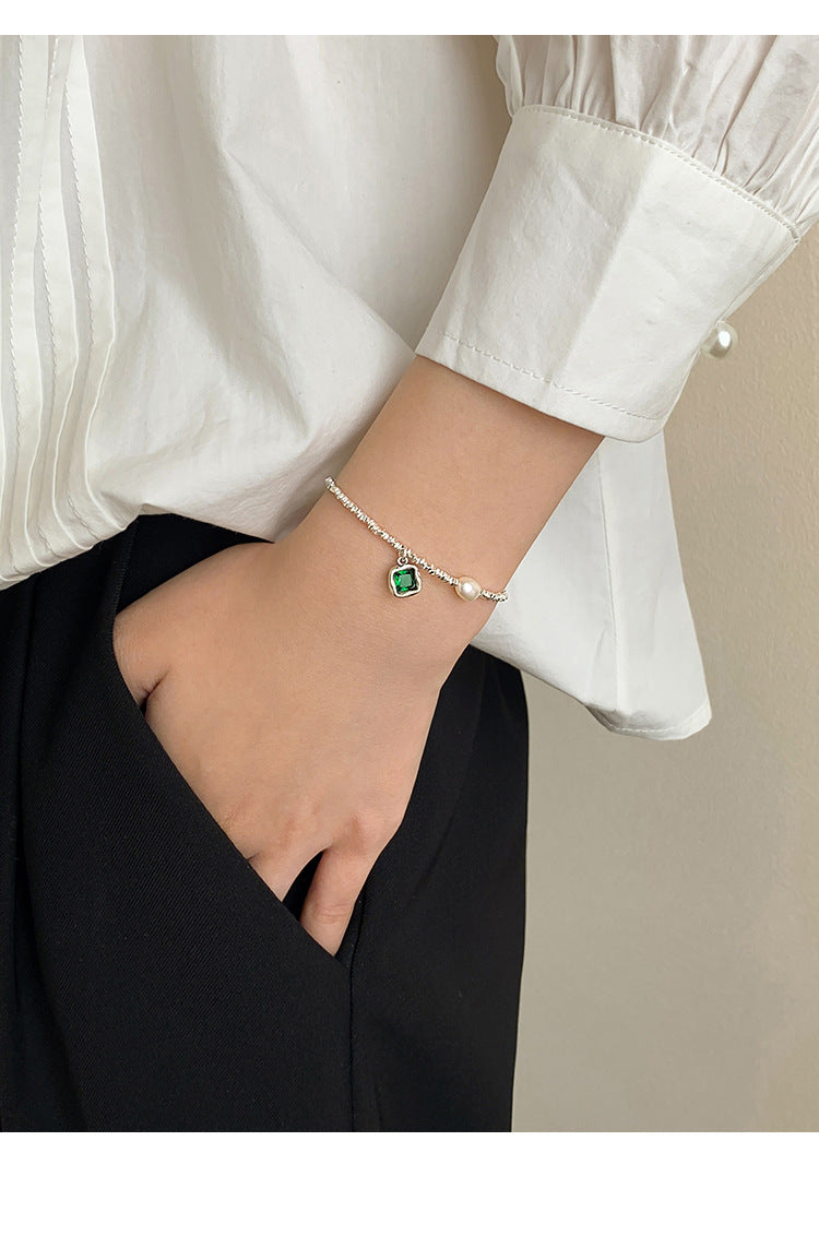 Handcrafted S925 Silver Necklace and Bracelet with Emerald Diamond and Pearl - Elegant Niche Design